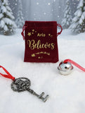 Christmas Believe Bell in a velvet bag