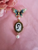 Single Photo Bouquet Charm on a Gold Butterfly Brooch.