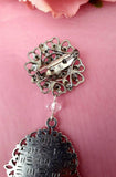 Single or Double Photo Bouquet Charm on a Rhinestone Brooch.